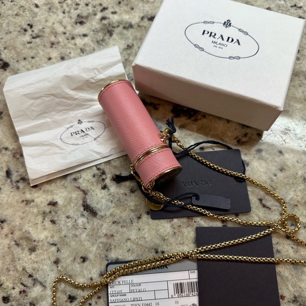 Prada new in box pink saffiano leather and gold hardware lipstick case necklace